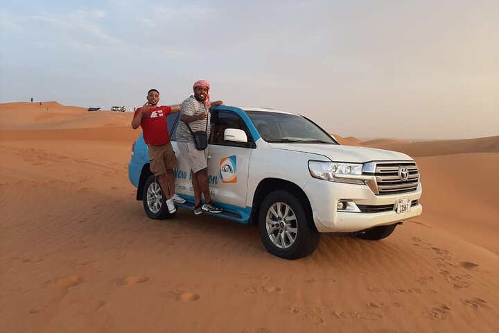 Premium Red Dune Safari with sandboarding, camel ride,Dinner and entertainment  - Image 4