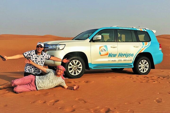 Premium Red Dune Safari with sandboarding, camel ride,Dinner and entertainment  - Image 1