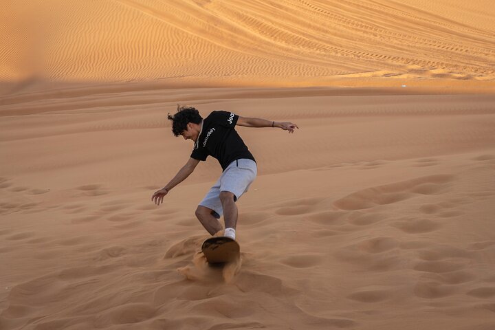 Premium Red Dunes Bashing with Quad Bike, Camel, Falcon &VIP Camp - Image 2