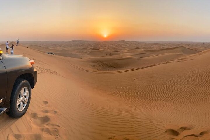 Private Desert Excursion with camel ride Sandboard & BBQ Dinner - Image 1