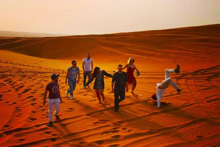 Private Desert Safari Red Dune with BBQ, Sand Boarding and Camel Ride - Image 5