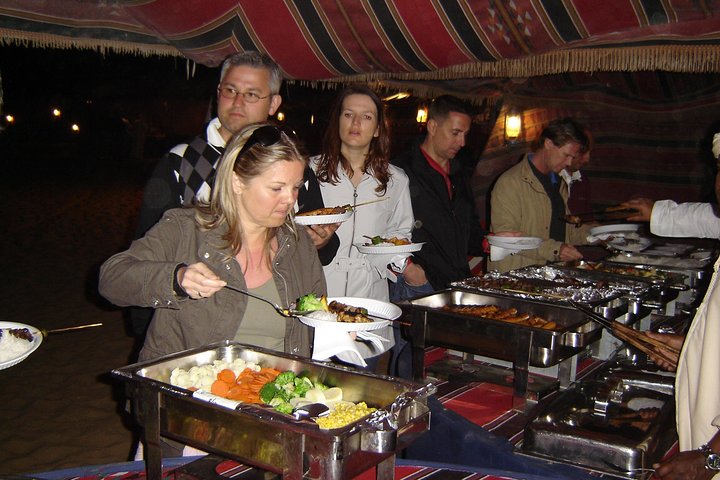 Private Desert Safari With Sand Boarding Quad bike and Camel Ride BBQ Dinner - Image 5