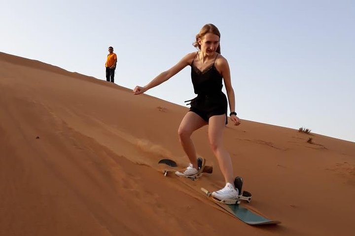 PRIVATE Dubai Desert Safari with BBQ Dinner, Camel Ride, Sand boarding & Shows - Image 5