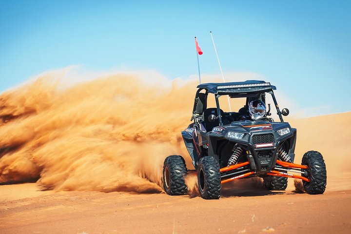 Private Dune Buggy Adventure with Sand boarding and Refreshments from Dubai - Image 1
