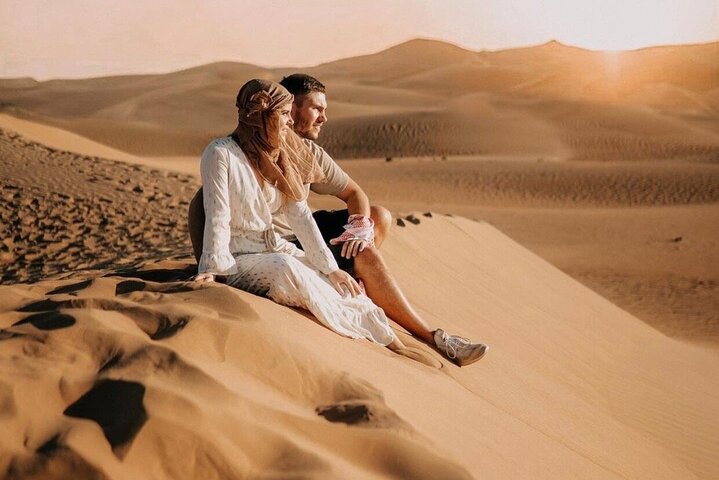 Private Evening Desert Safari with BBQ Dinner, Camel Ride And Sand Boarding  - Image 1