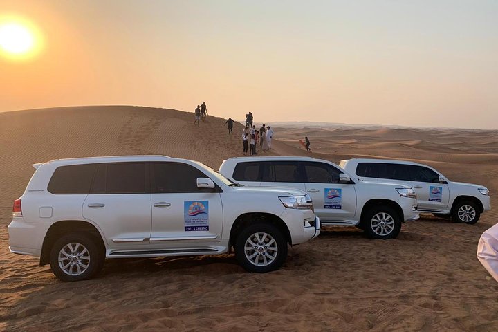 Private Evening Desert safari with BBQ Dinner, Camel Ride, Sand Boarding  - Image 2