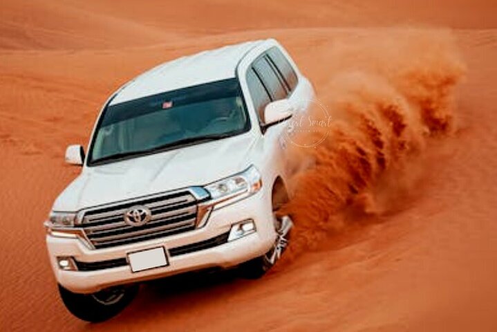 Private Evening Desert Safari with BBQ Dinner in Dubai - Image 1