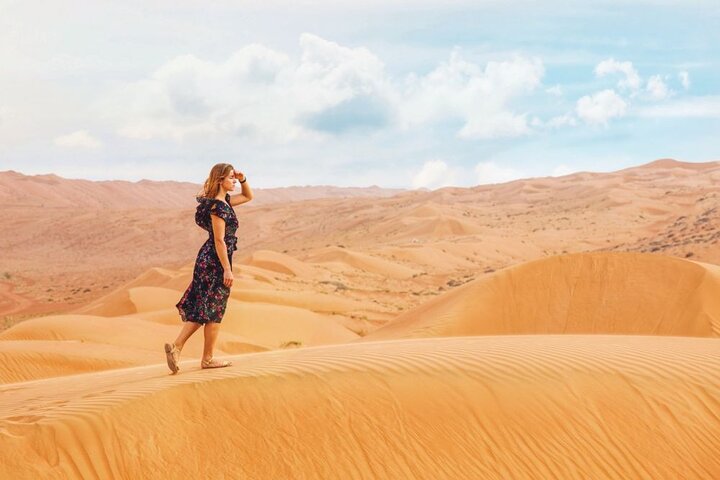 Private Morning Desert Safari with Camel Ride and Sand Boarding in Red Sand - Image 1