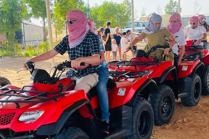 Quad Bike Tour ,BBQ Dinner, Camel Ride, Sand surf, Belly dance and much more - Image 1