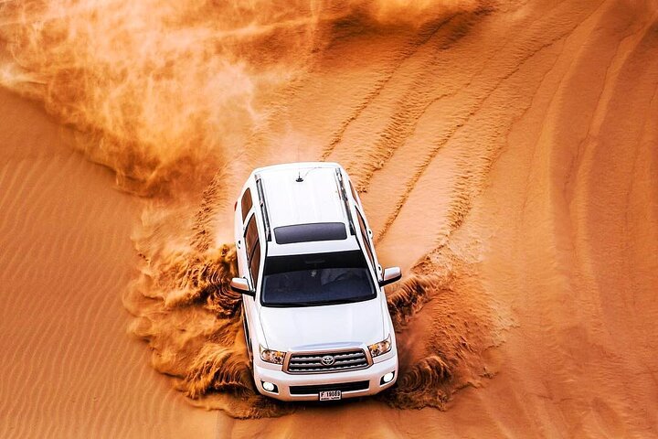 Red Dune 4x4 Desert Safari with Camel ride & BBQ Dinner - Image 3