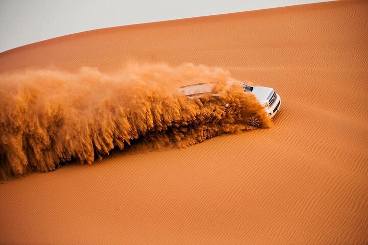 Red Dune 4x4 Desert Safari with Camel ride & BBQ Dinner - Image 1