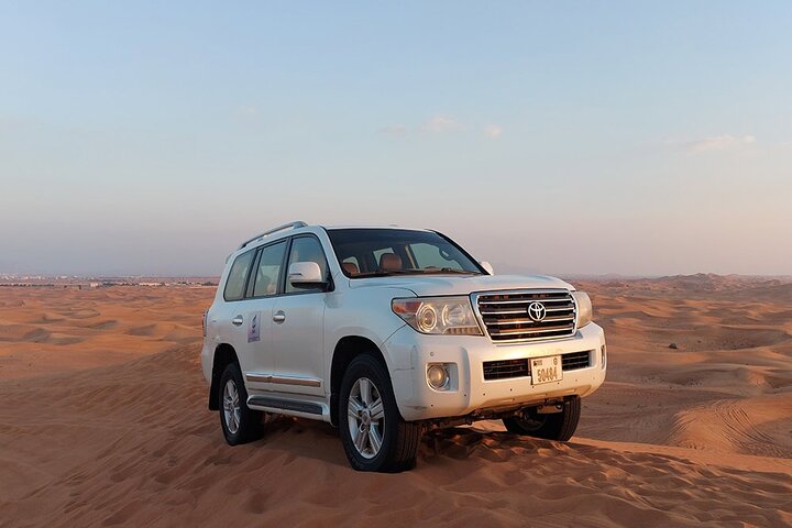 Red Dune Bashing with Camel Ride Sandboard Sunset Pictures & BBQ Dinner - Image 5
