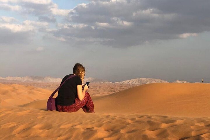 Red Dune Bashing with Camel Ride Sandboard Sunset Pictures & BBQ Dinner - Image 4
