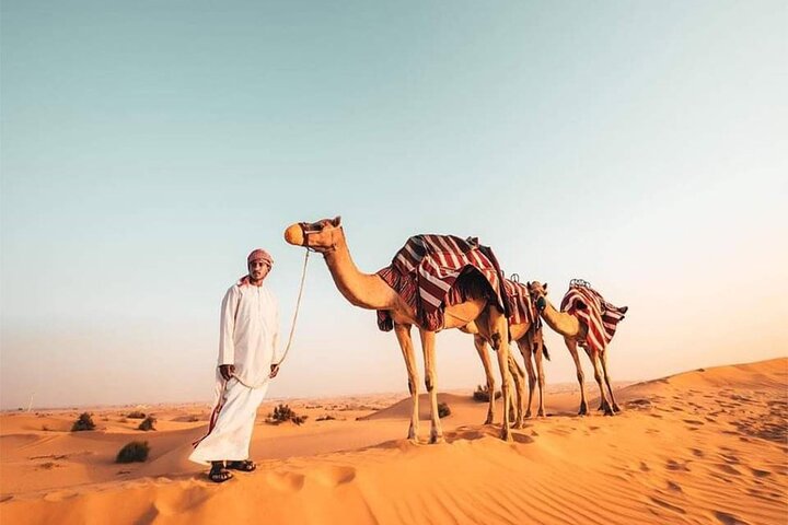 Red Dune Bashing with Camel Ride Sandboard Sunset Pictures & BBQ Dinner - Image 3