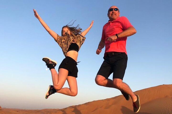 Red Dune Bashing with Camel Ride Sandboard Sunset Pictures & BBQ Dinner - Image 2