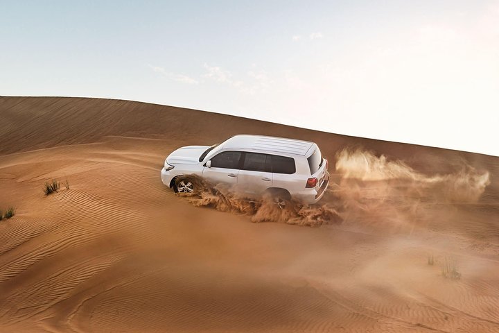Red Dune Desert Safari with BBQ Dinner, Sand Boarding Dance Shows - Image 1
