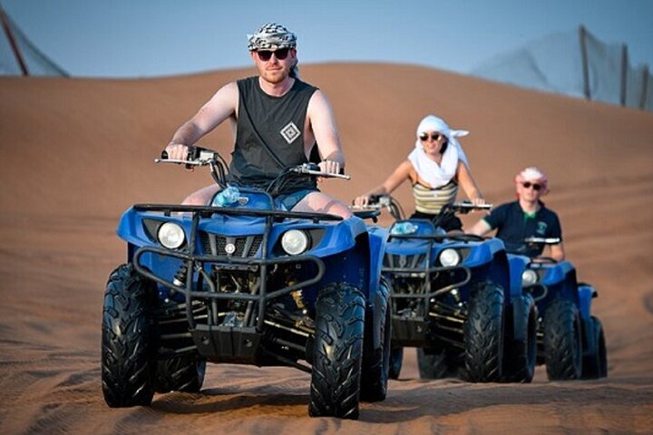 Red Dune Desert Safari with Dinner Quad Bike and Camel Ride - Image 1