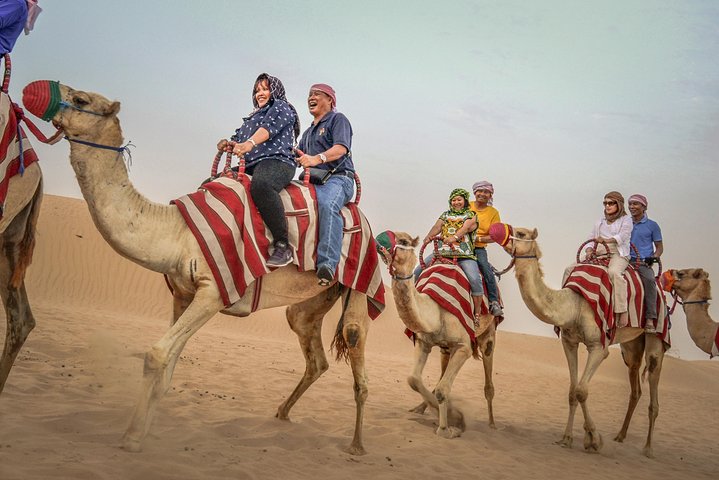 Red Dunes by Quad Bike, Camel Ride, Sandboarding and BBQ - Image 3