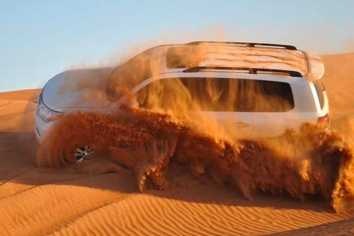 Red Dunes Desert Safari, Sand Board, Camel Ride with BBQ Dinner in Premium Camp - Image 2