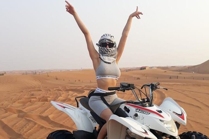 Red Sand Morning Desert Safari With Quad Bike, Sand Boarding & Camel Ride - Image 1