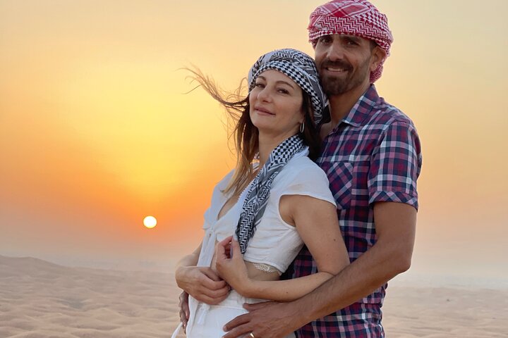 Sunrise Desert Safari with Sand Boarding and Camel Ride - Image 1