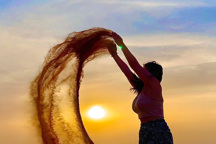 Sunrise Desert Safari with Sand Boarding and Camel Ride - Image 3