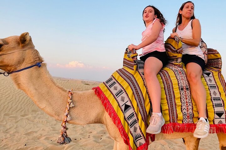 Sunrise Desert Safari with Sand Boarding and Camel Ride - Image 2