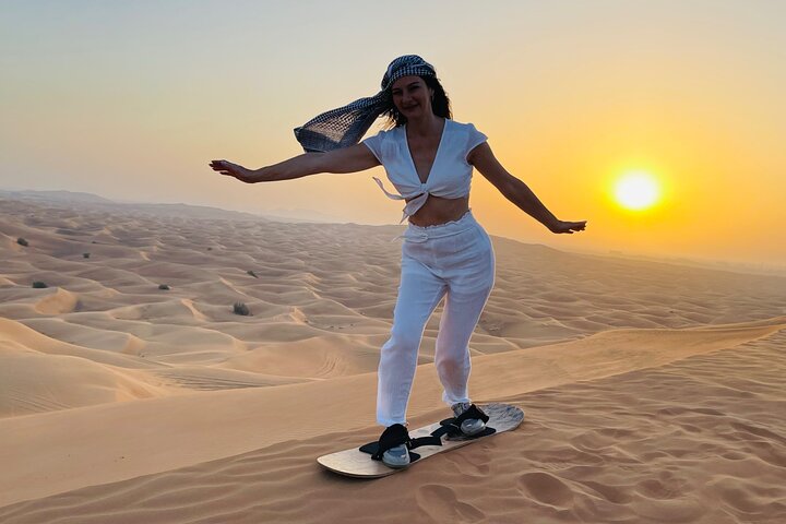 Sunrise Desert Safari with Sand Boarding and Camel Ride - Image 4