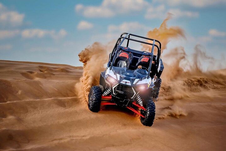 Sunset Buggy Ride with Sandboarding and Camel Ridding - Image 1