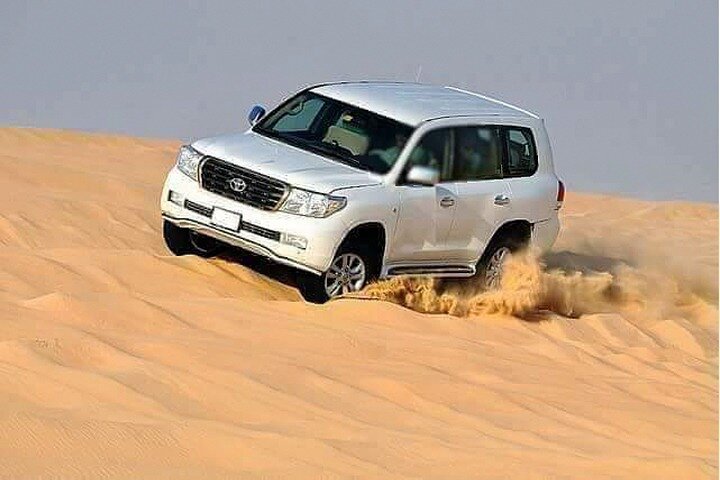 Sunset Desert Safari with BBQ, Camel Ride & Sandboarding - Image 3