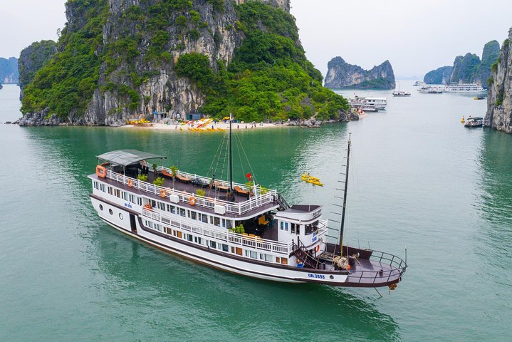 Bai Tu Long Bay Cruise 2D/1N: Kayaking, Swimming at pristine places & Full Meals - Image 2
