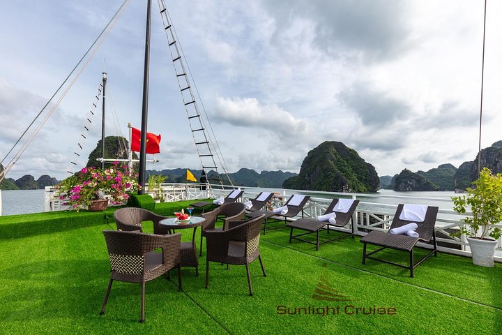 Halong Deluxe Cruise 2D/1N: Kayaking, Swimming, Cave, Titop island & Full Meals - Image 4