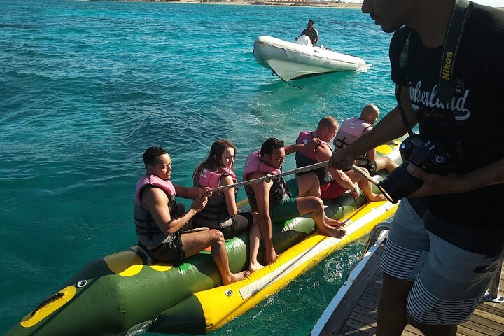 Dolphin tour & banana boat fun with snorkeling from Hurghada - Image 5