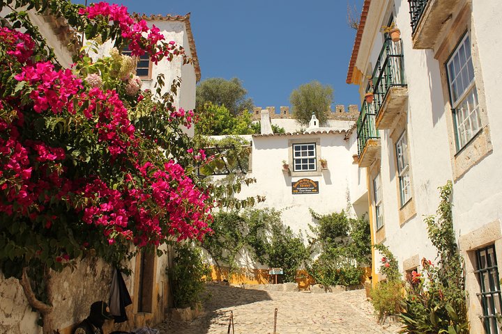 From Lisbon - Private Tour to Obidos, Nazare and Fatima with Drop-off in Porto - Image 1