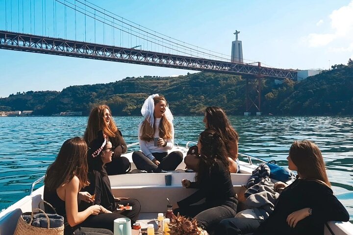 Lisbon: Sunset Boat Tour with Thoughtfully Chosen Wines & Snacks - Image 1
