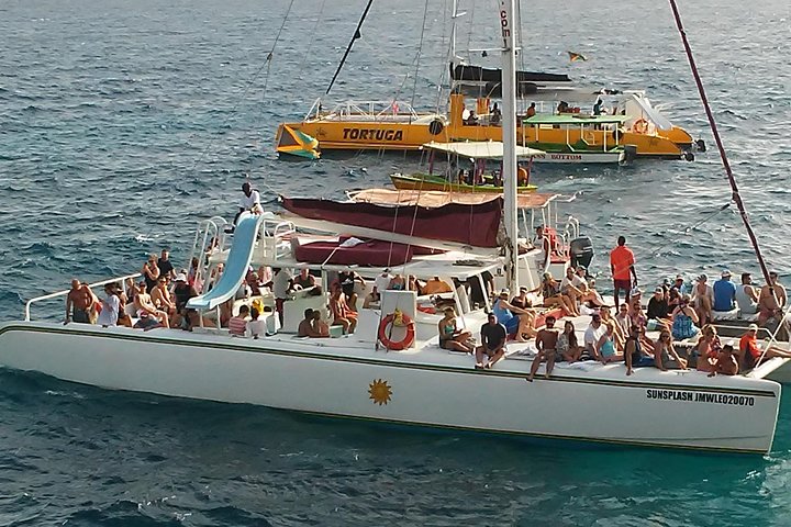 Negril seven Miles Beach| Rick's Café Sun Set | with Open Bar Catamaran is fun: - Image 1