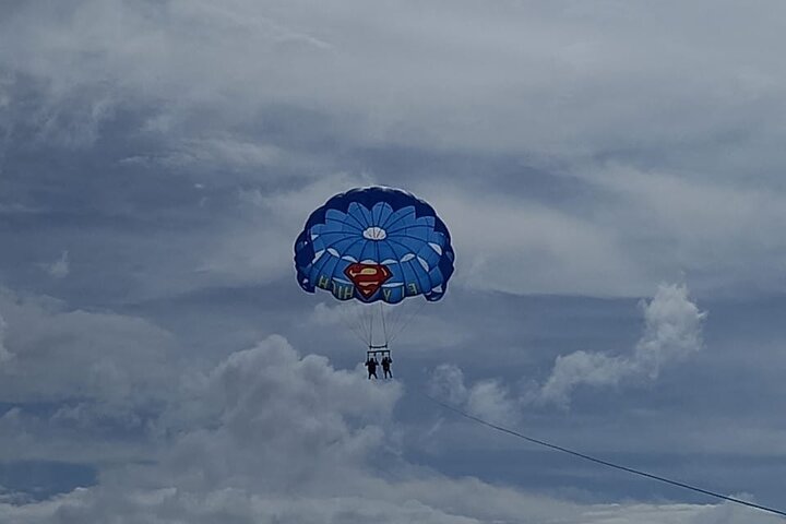 Parasailing, Blue Hole Mineral Spring, Seven Mile Beach - Image 1