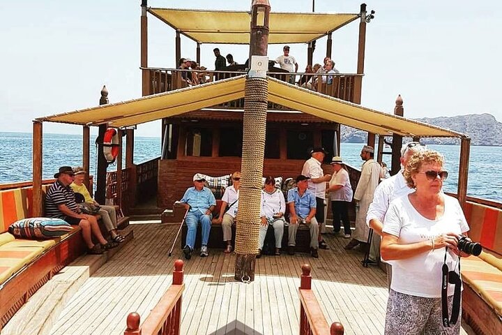 Omani Traditional Dhow Cruise: Sunset and Muscat Coastal View - Image 3