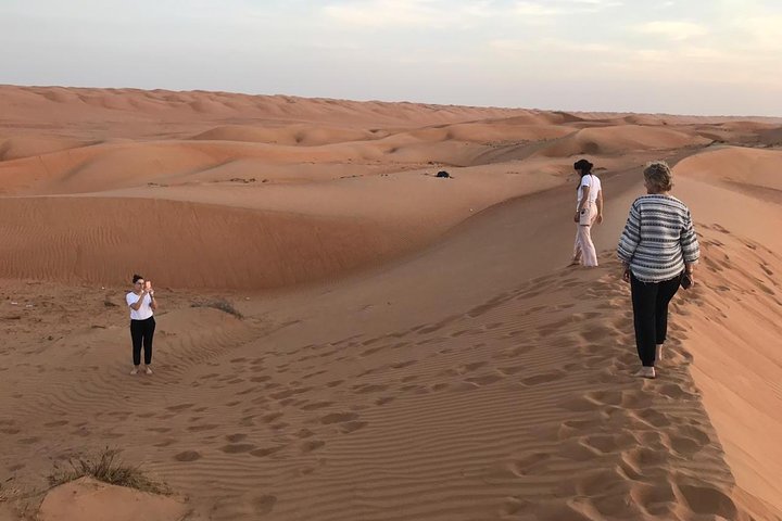 Private Day Trip to Wahiba Sands & Wadi Bani Khalid, Price Up To 5 Person - Image 1