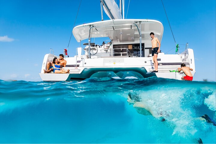 Catamaran Day & Sunset Cruises with meals Drinks and transportation - Image 1