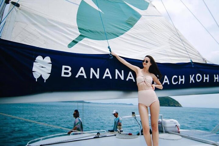 Half-Day Banana Beach Sunset Sail by Luxury Catamaran - Image 1