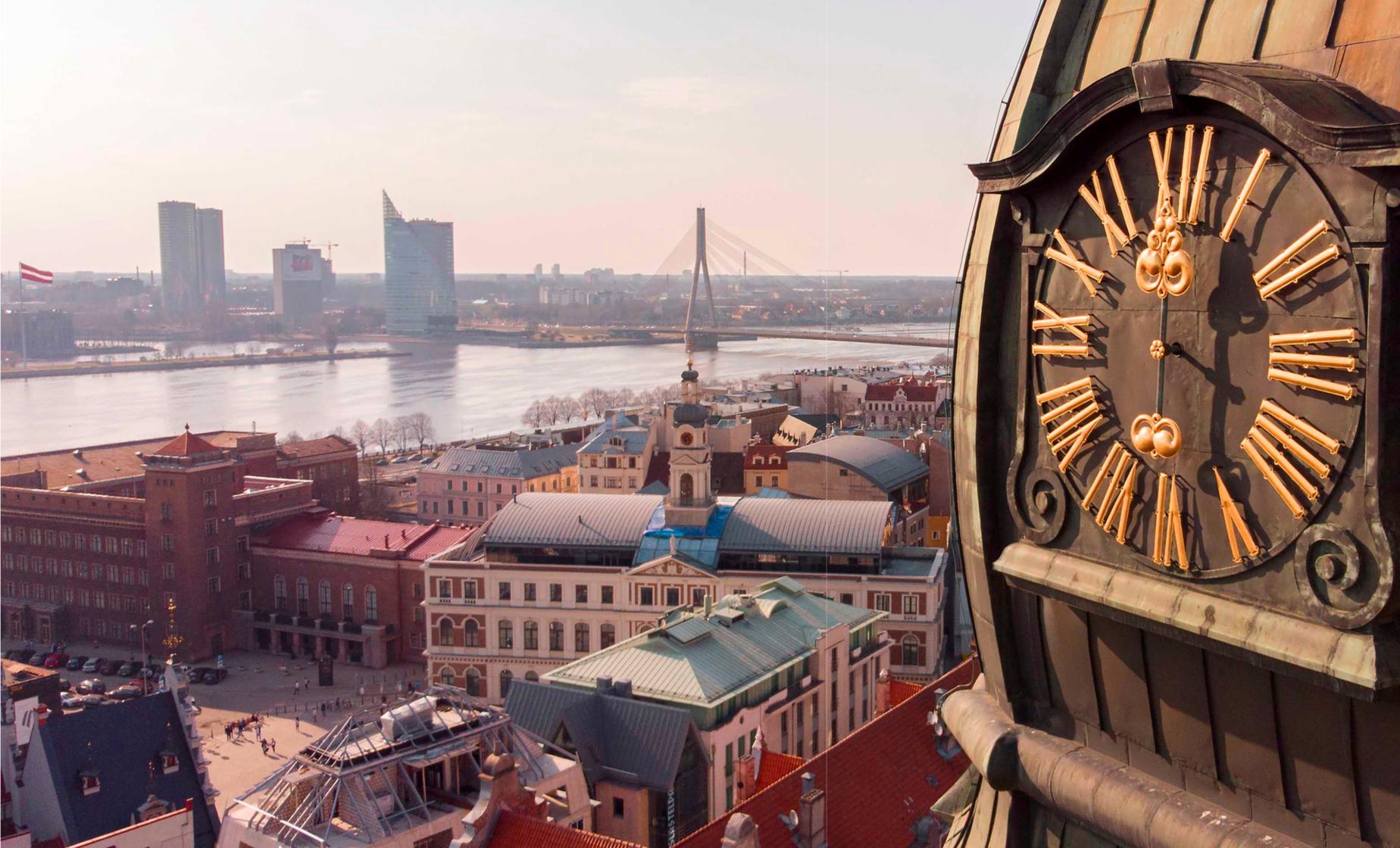 Medieval Riga by Land and Guided Boat Ride - Image 1