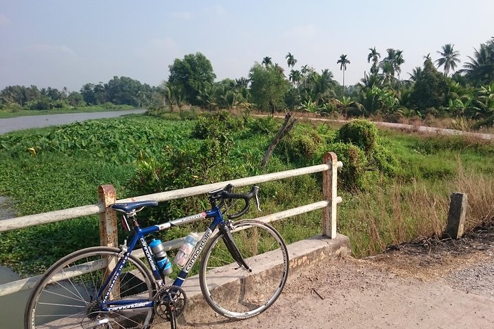 Cycling to CuChi tunnels - single track ride along Saigon river. - Image 2
