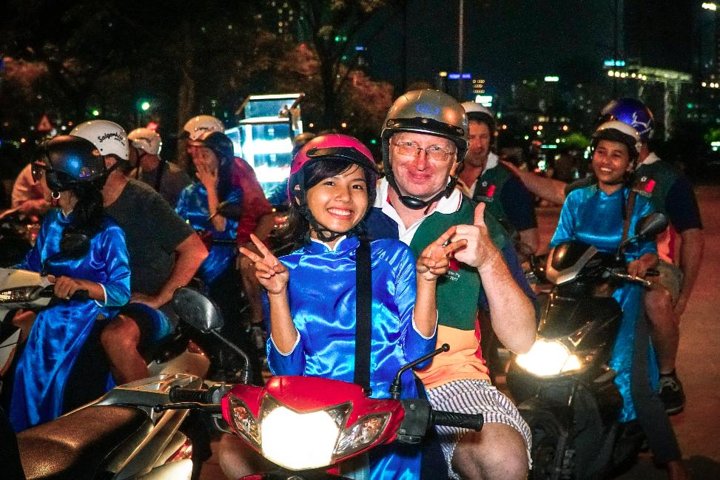 GirlPower Saigon By Night Tour by Scooters with Female Drivers | Kiss Tours - Image 5