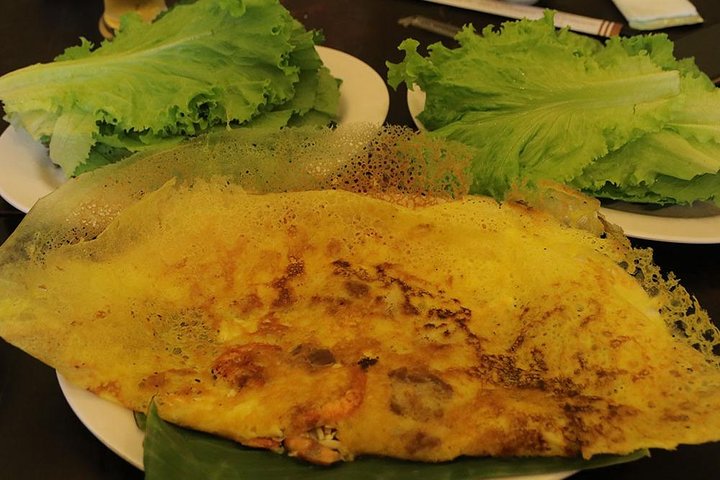 Private Ho Chi Minh Food Adventure by Motorbike with Local Students - Image 3