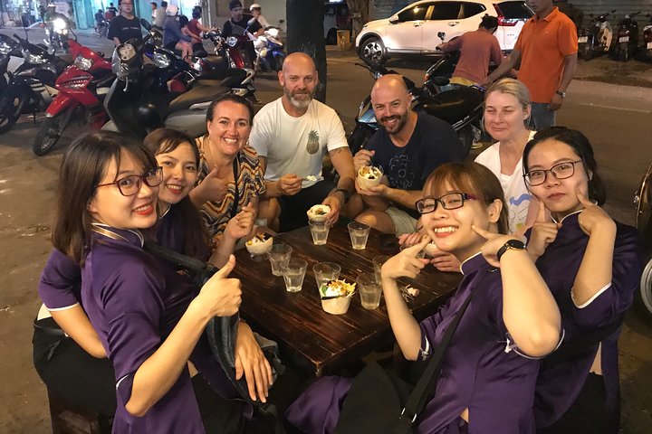 Private Ho Chi Minh Street Food Tour by Motorbike with Ao Dai Female Rider - Image 3