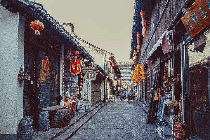 Shanghai Layover Tour to Xinchang Water Town with City Highlights Option - Image 2