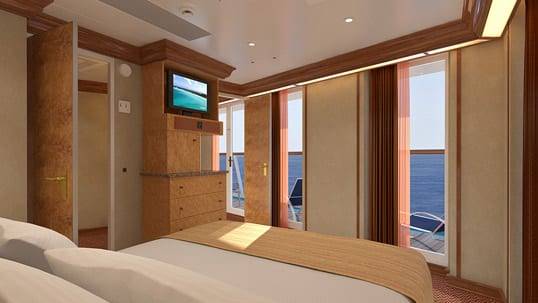 Carnival Legend Vista Suite (VS) bedroom, photo 2 of 4
