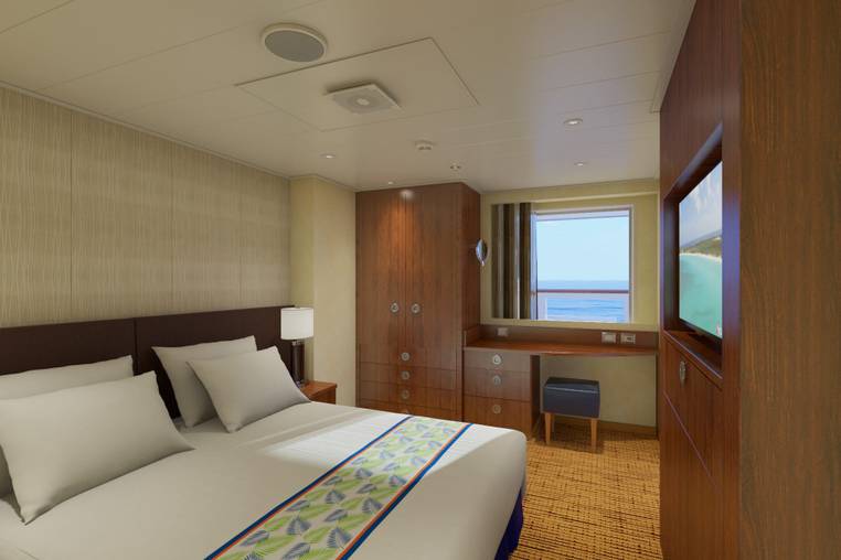 Carnival Sunrise Captain's Suite (CS) bedroom