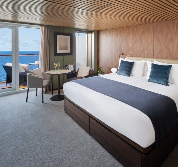 Norwegian Aura The Haven Deluxe Owner's Suite with Large Balcony (H3) bedroom, photo 1 of 2